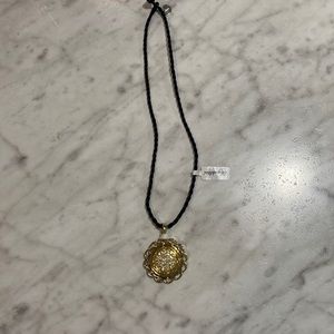 Gold bloom pendant with necklace